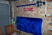 A sort of blue soft thing, stuck to the wall. Nice to look at, nicer to touch.